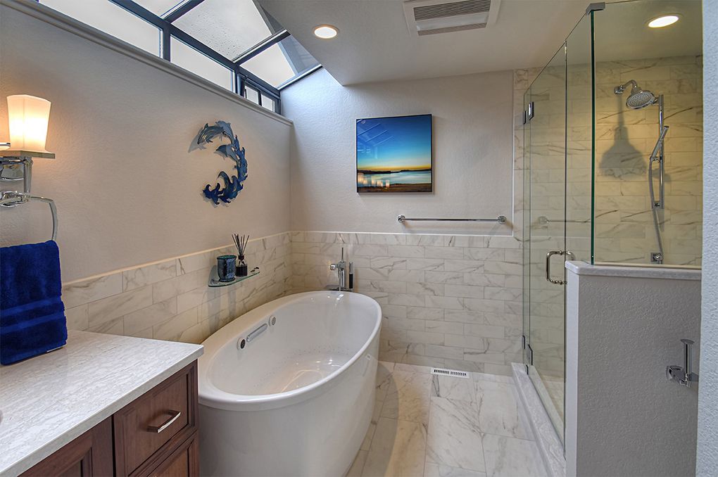 Heated floors add comfort to any style bathroom. (Chermack Construction)