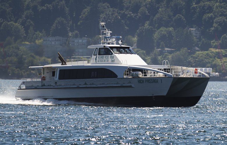 Kitsap Transit’s new fast ferry, complete with a hydrofoil design reducing drag, cruises on Friday, June 30, 2017 atop Elliott Bay. The boat has a seating capacity of 118 people and will travel from Bremerton to Seattle in 28 minutes. It is set to start service on Monday, July 10.  202633
