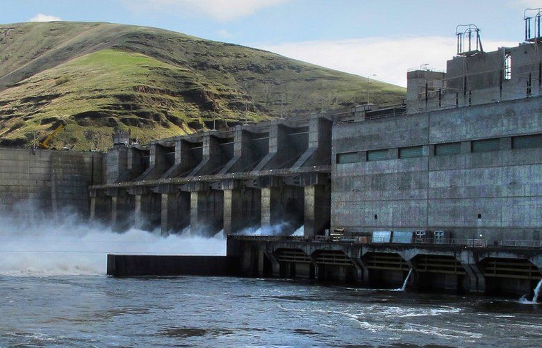 File – In this April 11, 2018 file photo, water moves through a spillway of the Lower Granite Dam on the Snake River near Almota, Wash. The House has approved a bill Wednesday, April 25, 2018, that would effectively reverse a federal judge’s order to spill water from four Pacific Northwest dams to help migrating salmon reach the Pacific Ocean. The bill’s sponsors say the four Snake River dams provide hydropower, flood control and other benefits while allowing record salmon runs. (AP Photo/Nicholas K. Geranios, File)