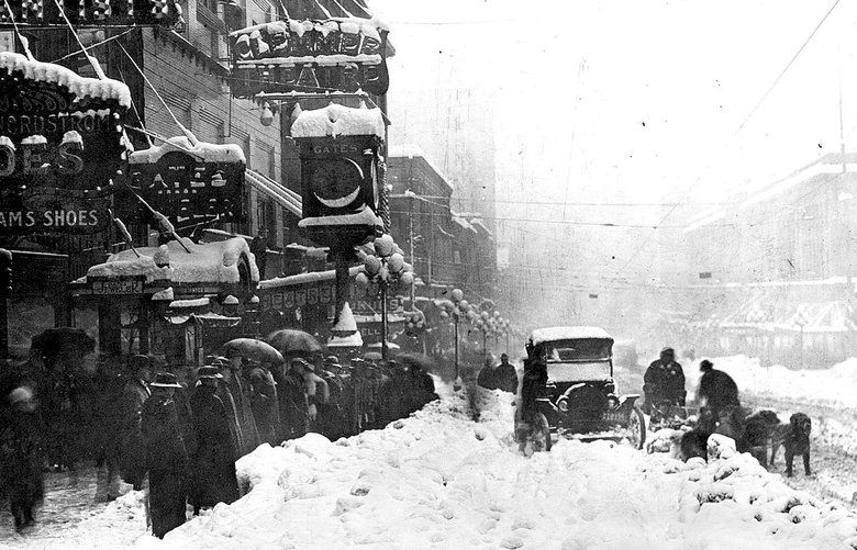 BIG SNOW IN SEATTLE : FEB. 1916 : THE DOG SLEDS WERE RUNNING, BUT THAT’S ABOUT ALL, IN THE BIG SNOW OF 1916. IN SEATTLE, 35 INCHES FELL IN FOUR DAYS, BEGINNING ON THE LAST DAY OF JANUARY. STREETCAR OPERATION CEASED FOR NEARLY A WEEK, AND A NUMBER OF ROOFS COLLAPSED, INCLUDING THE LANDMARK OCTAGONAL, COPPER-SKINNED DOME OF ST. JAMES CATHEDRAL.