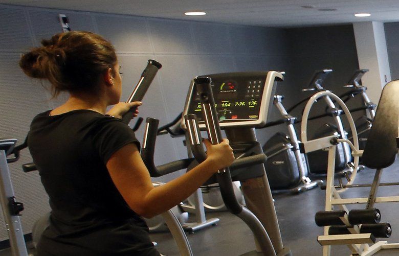 French army Marine officers exercise in the gym room at the new building of the French Defense Ministry at Balard district, in Paris, Friday, Oct, 30, 2015. The building’s walls are designed to withstand a missile strike and a highly secured operational room is hidden underground. After a particularly dangerous year, French army chiefs are moving into their new defense ministry, dubbed the French Pentagon, aimed at a quicker response to terrorism and other threats. (AP Photo/Francois Mori) ZFM113