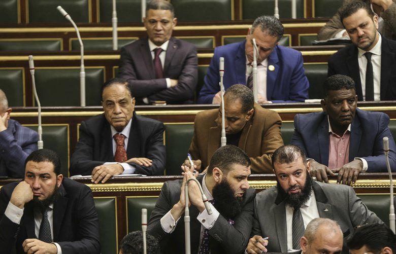 Members of Egypt’s Parliament meet to deliberate constitutional amendments that could allow President Abdel-Fattah el-Sissi to stay in office till 2034, in Cairo Egypt, Wednesday, Feb 13, 2019. Wednesday’s session will lead to a vote later in the evening or on Thursday, after which the text of the amendments would be finalized by a special committee for a final decision within two months. El-Sissi’s current second term expires in 2022. (AP Photo) CAITH103 CAITH103