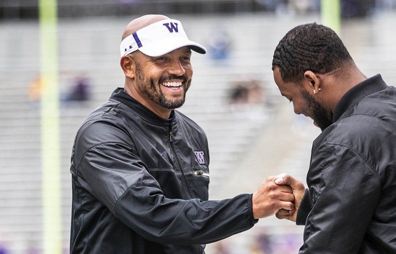 Co-defensive coordinator Jimmy Lake staying at Washington, with a smile ...