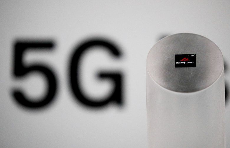 Huawei 5G modem Balong 5000 chipset is displayed after the presentation event in Beijing, Thursday, Jan. 24, 2019. Chinese tech giant Huawei has announced plans to release a next-generation smartphone based on its own technology instead of U.S. components, stepping up efforts to compete with global industry leaders. (AP Photo/Andy Wong) 