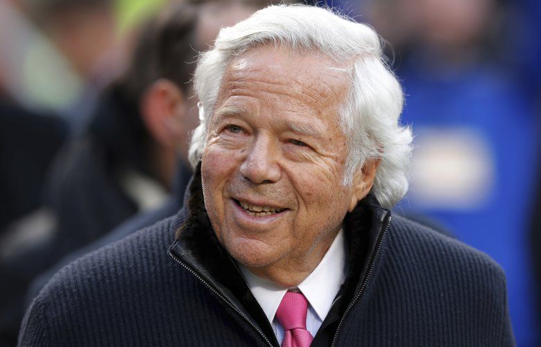 FILE – In this Jan. 20, 2019, file photo, New England Patriots owner Robert Kraft walks on the field before the AFC Championship NFL football game between the Kansas City Chiefs and the New England Patriots, in Kansas City, Mo. Police in Florida have charged New England Patriots owner Robert Kraft with misdemeanor solicitation of prostitution, saying they have videotape of him paying for a sex act inside an illicit massage parlor.  Jupiter police told reporters Friday, Feb. 22, 2019, that the 77-year-old Kraft has not been arrested. (AP Photo/Charlie Neibergall, File) NY170 NY170