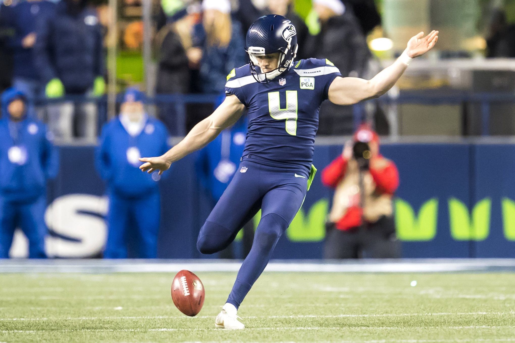 Seattle Seahawks punter Michael Dickson (4) runs off the field at the end  of the first half of an NFL football game against the Seattle Seahawks in  Detroit, Michigan USA, on Sunday