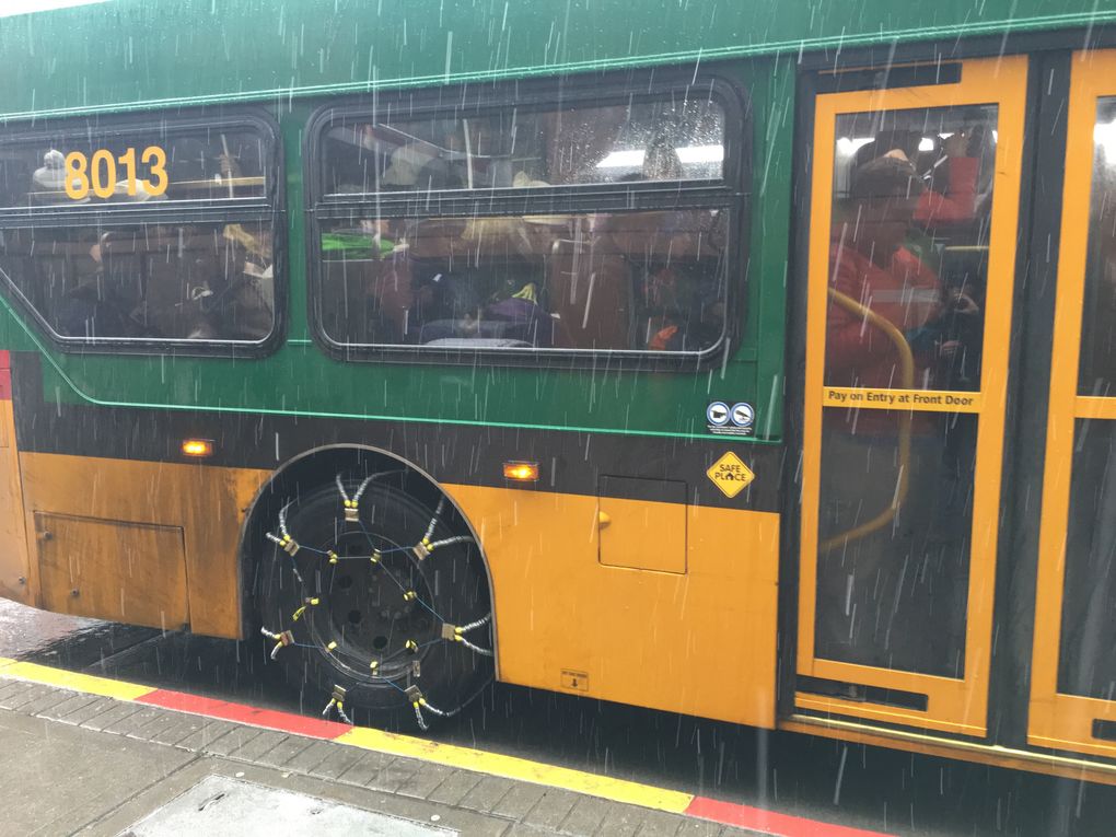 A 28 Express bus passes a downtown Seattle stop because it was already packed with riders. (Ben Romano / The Seattle Times)