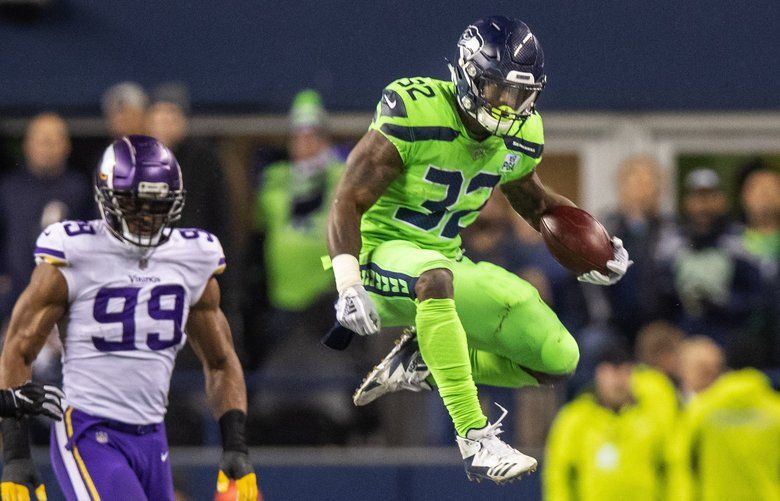 Seattle Seahawks' running back Chris Carson takes part in an NFL training  session at the Grove Hotel in Chandler's Cross, Watford, England, Thursday,  Oct. 11, 2018. The Seattle Seahawks are preparing for