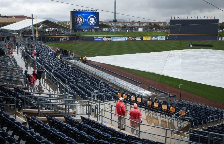 Sights and sounds from Day 10 of Mariners spring training: Rain, more ...