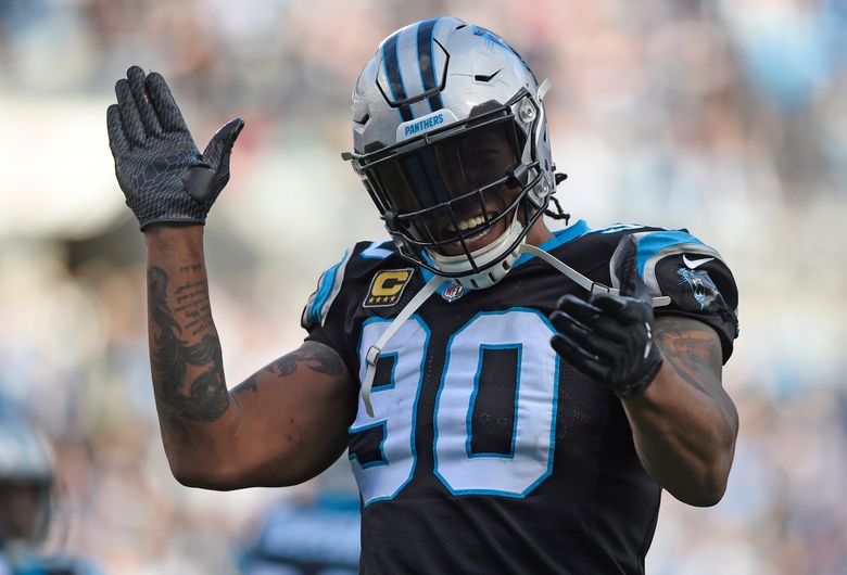 Carolina Panthers defensive end Julius Peppers (90) reacts after Tampa Bay  missed a field goal attempt