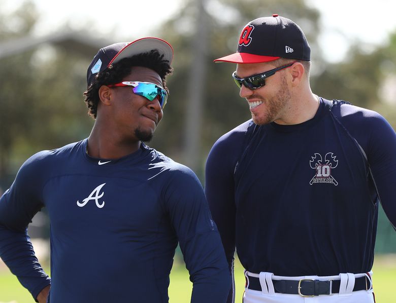 Braves open spring training as confident NL East champions