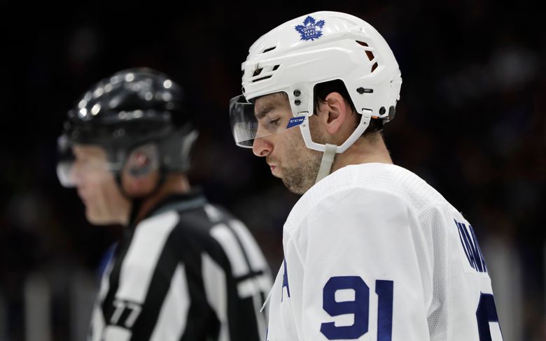 Toronto Maple Leafs center John Tavares (91) reacts after picking