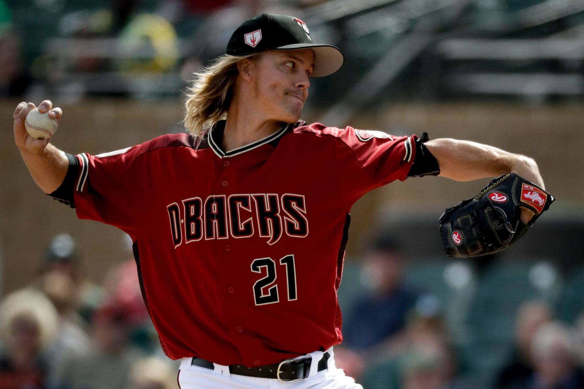 Greinke getting more comfortable with attention