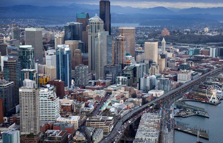 Looking southeast towards the Seattle skyline and the Alaskan Way viaduct during rush hour  Friday, January 4, 2019.  The viaduct will be permanently shut down on January 11, 2018 and then demolished, altering the value of real estate downtown.  
 208811 208811