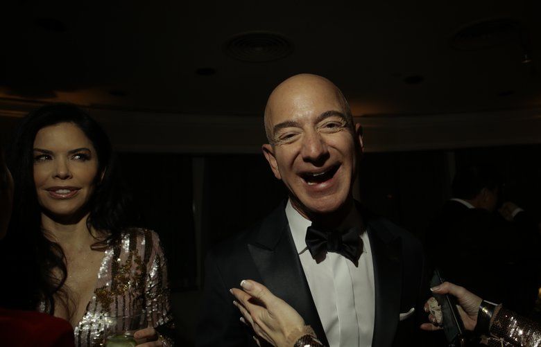  Jeff Bezos of Amazon at a Golden Globes afterparty in Los Angeles, Jan. 6, 2019. In the weeks since the Amazon founder tweeted that he would divorce his wife of 25 years and started an open war against a grocery store tabloid that divulged details of his affair to with reality TV host, an out-of-control Hollywood sex scandal has ensnarled Bezos. (Elizabeth Lippman/The New York Times) 