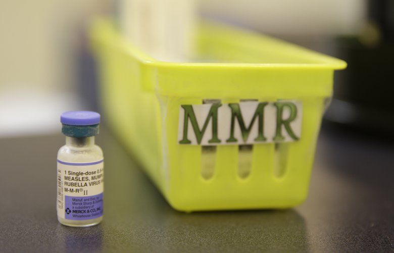 FILE – This Feb. 6, 2015, file photo, shows a measles, mumps and rubella vaccine on a countertop at a pediatrics clinic in Greenbrae, Calif. A measles outbreak near Portland, Ore., has revived a bitter debate over so-called â€œphilosophicalâ€ exemptions to childhood vaccinations as public health officials across the Pacific Northwest scramble to limit the fallout from the disease. Washington Gov. Jay Inslee last week declared a state of emergency because of the outbreak on Friday, Jan. 25, 2019. (AP Photo/Eric Risberg, File)