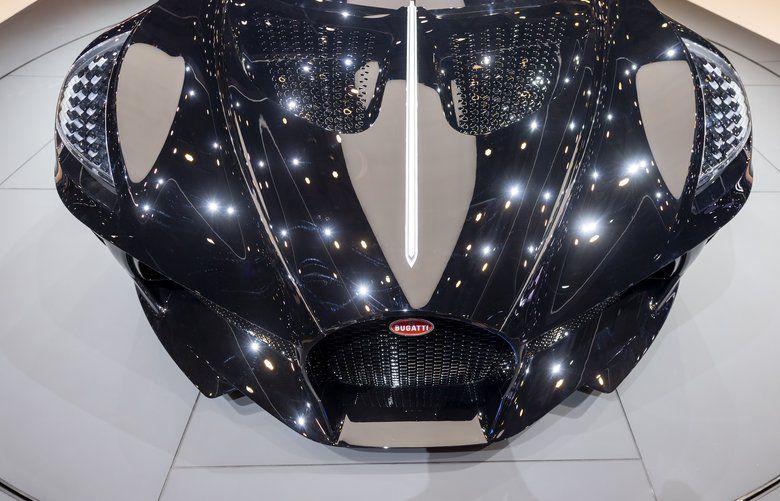 The new Bugatti La Voiture Noire is presented in Geneva, Switzerland, on Tuesday, March 5, 2019. (Martial Trezzini/Keystone via AP) 