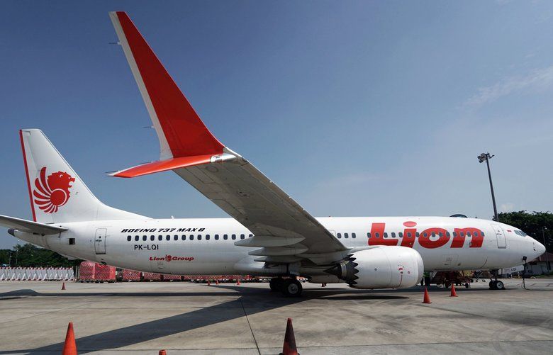 A grounded Lion Air Boeing Co. 737 Max 8 aircraft sits on the tarmac at terminal 1 of Soekarno-Hatta International Airport in Cenkareng, Indonesia, on Tuesday, March 15, 2019. Sunday’s loss of an Ethiopian Airlines Boeing 737, in which 157 people died, bore similarities to the Oct. 29 crash of another Boeing 737 Max plane, operated by Indonesia’s Lion Air, stoking concern that a feature meant to make the upgraded Max safer than earlier planes has actually made it harder to fly. Photographer: Dimas Ardian/Bloomberg 775315808