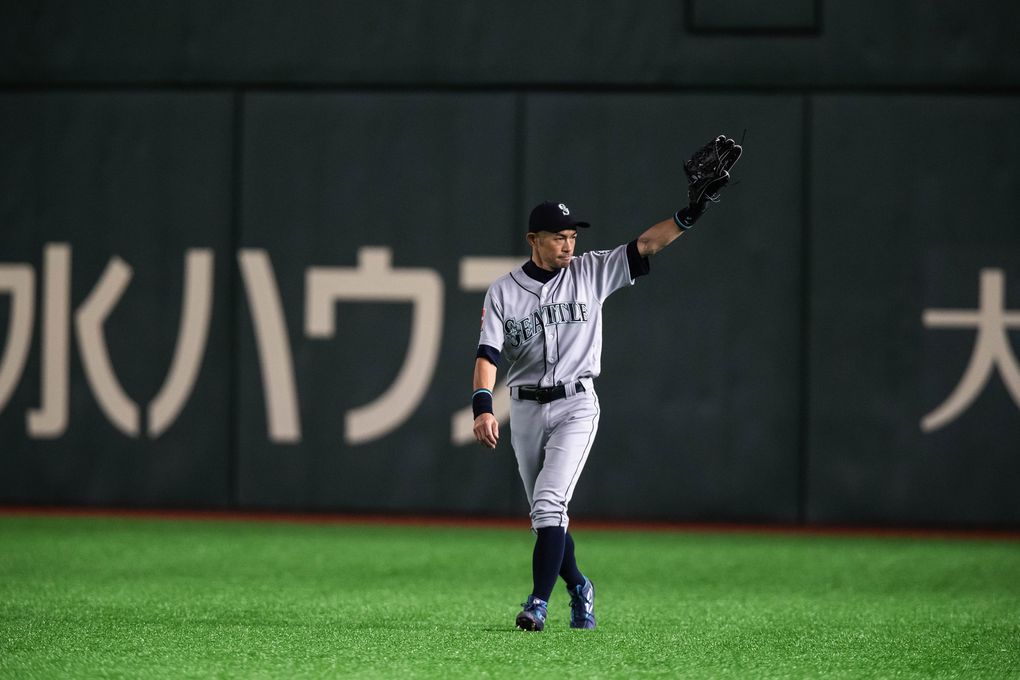 Mariners right fielder Ichiro leaves Thursday’s game in the eighth inning to thunderous applause in the Tokyo Dome. (Dean Rutz / The Seattle Times)