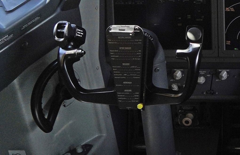 The captain’s control column in a MAX cockpit. The thumb switches used to counter unwanted movement of the horizontal tail are at the top of the left hand arm of the column. (Dimas Ardian / Bloomberg)