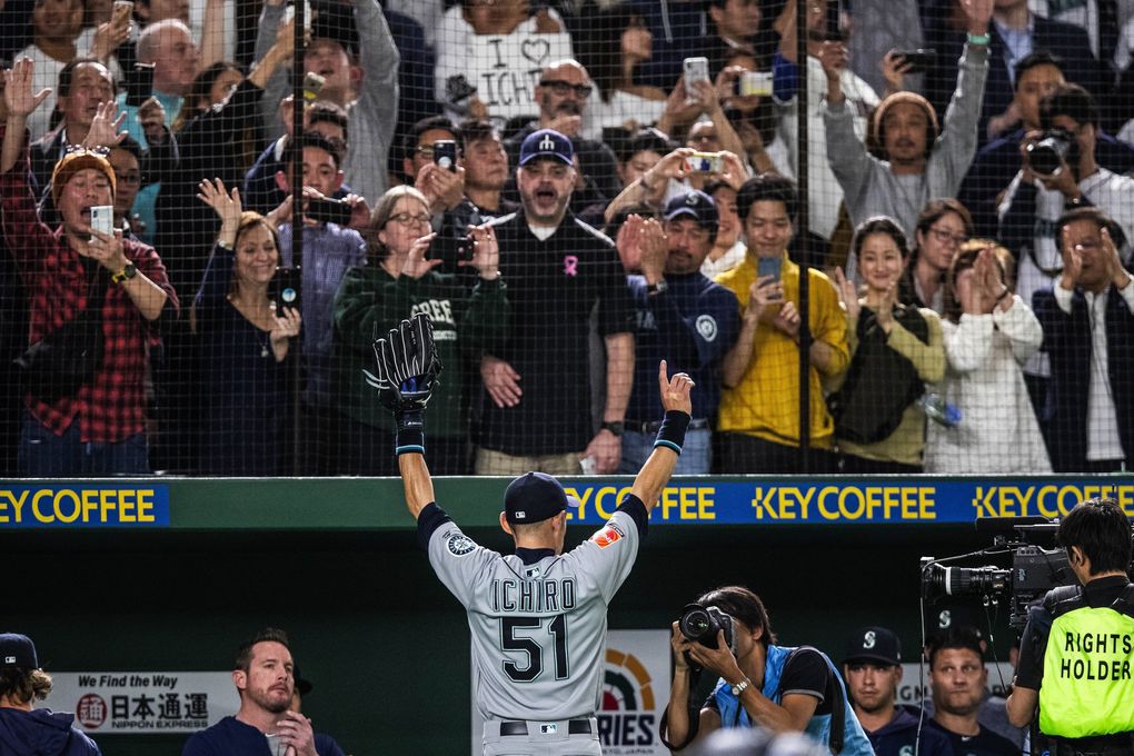 Ichiro’s curtain call comes in the eighth inning, pulled to a standing ovation in the Tokyo Dome. Word spread during Thursday’s game against the A’s that Ichiro would retire after the game, ending a 28-year professional baseball career. (Dean Rutz / The Seattle Times)