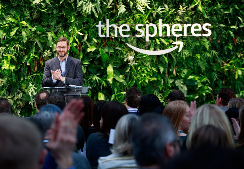 John Schoettler, Amazon’s top real estate executive,  speaks at the opening of the Spheres on Amazon’s campus last year. Schoettler connected the company with Northwest Center in 2002. Besides directing job candidates to Amazon, Northwest Center also provides services to the company — including greeters at the Spheres. (Erika Schultz / The Seattle Times, 2018)