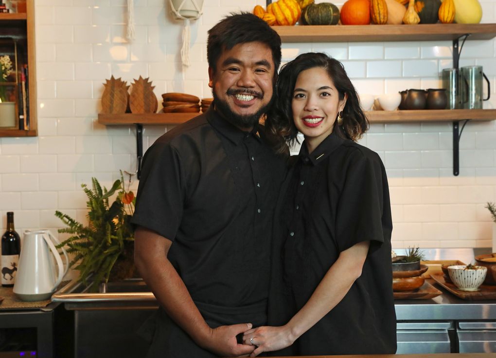 Aaron Verzosa and his wife, Amber Manuguid, opened Archipelago Dec. 1 in Hillman City. The couple execute a calm choreography as they prep, cook, plate and serve. (Ken Lambert / The Seattle Times)