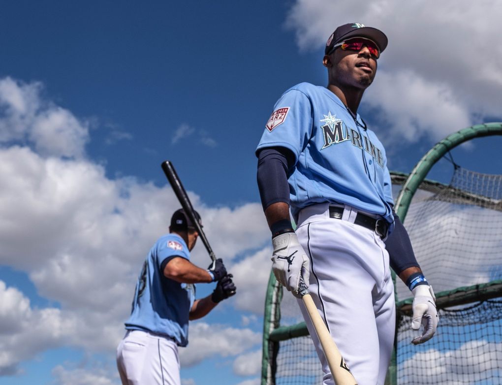 Outfielder Kyle Lewis exits the batting cage Feb. 18 in Peoria, Ariz. (Dean Rutz / The Seattle Times)