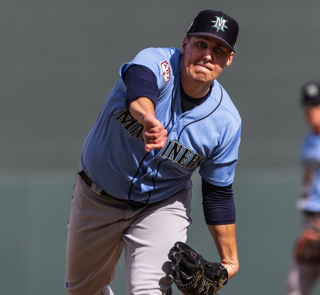 Mariners pitcher Erik Swanson throws Feb. 24 in Scottsdale, Ariz. (Dean Rutz / The Seattle Times)