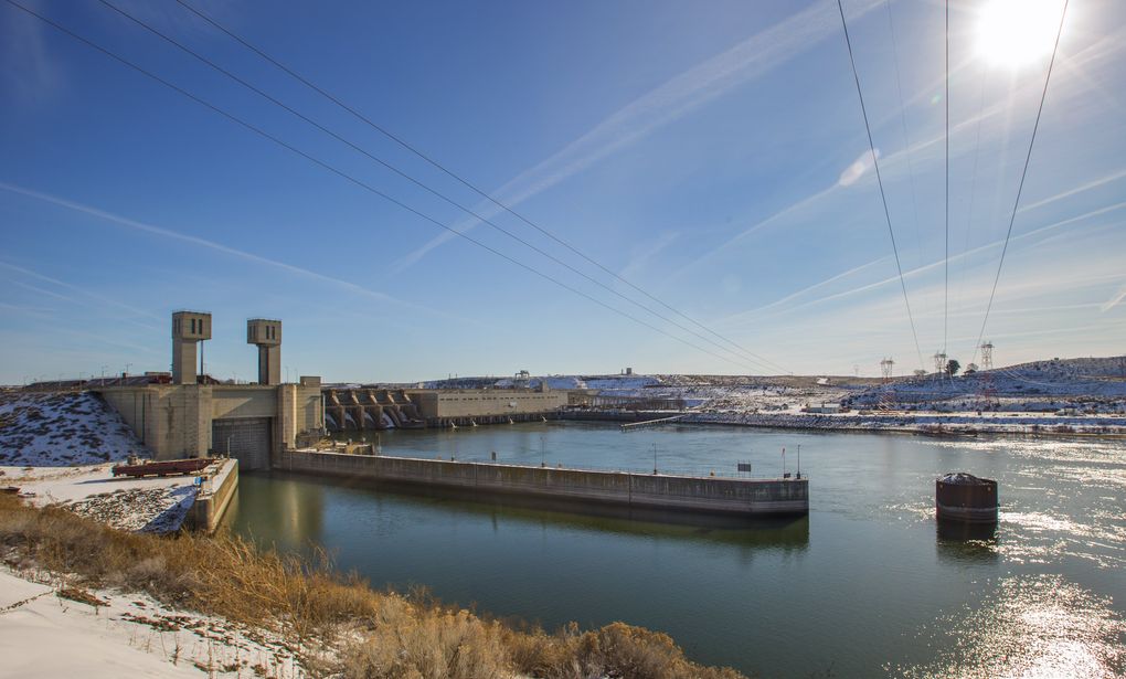 The Ice Harbor Lock and Dam near Pasco is the last dam before the Snake River flows into the Columbia River. In addition to passage for barge traffic through the locks in the foreground, the dam allows irrigation for 60,000 acres of otherwise arid land in the lower Snake River drainage. The four dams create about 1,000 average megawatts of power, enough to light some 800,000 homes. (Mike Siegel / The Seattle Times)