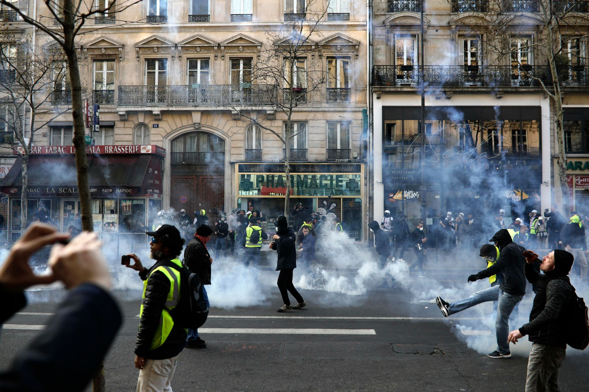 Paris protests: Scenes of destruction on Champs Elysées