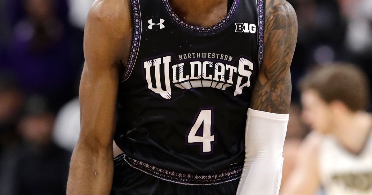 Northwestern’s Law carried off court with leg injury | The Seattle Times
