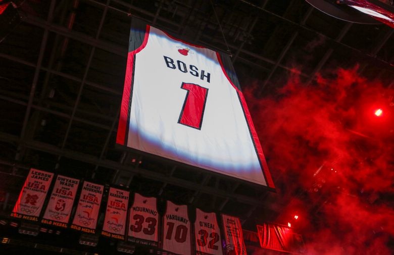 Heat raise Chris Bosh's No. 1 jersey to the rafters