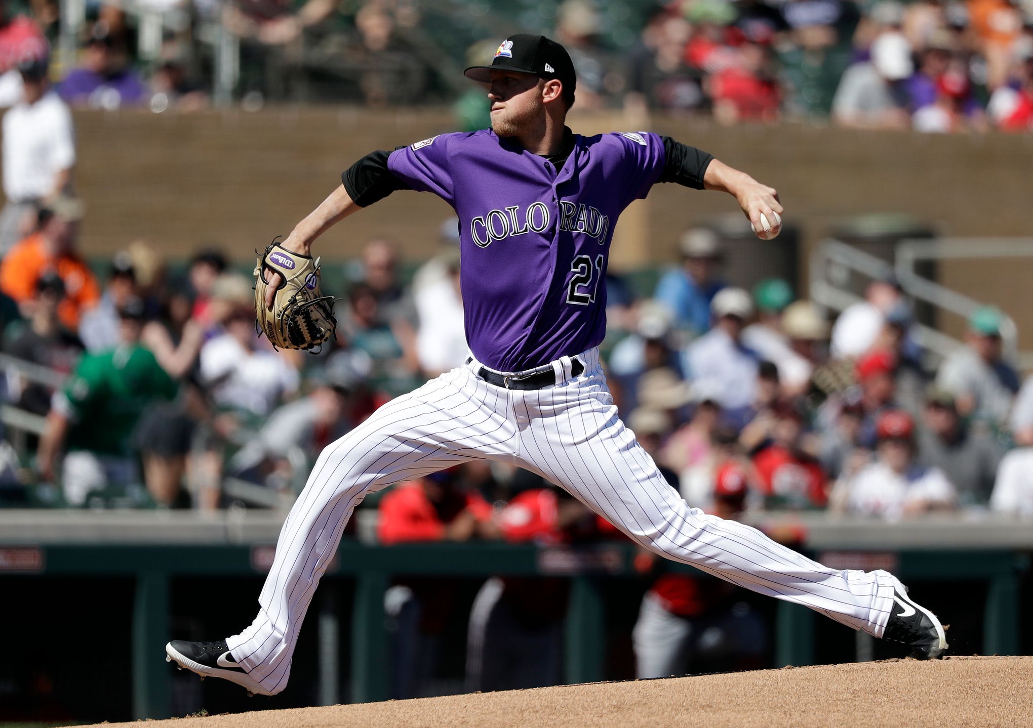 Rockies beat Marlins in series opener behind career outing from