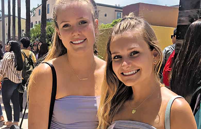 Caroline Toombs (right), a 2018 graduate of Eastlake High School in Sammamish, meets her roommate, Chloe Downes, for the first time on the University of California, Santa Barbara campus. (Courtesy of Caroline Toombs)