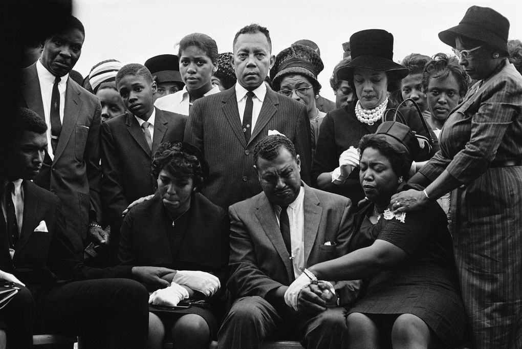 The family of Carole Robertson, one of four African American girls killed in the 16th Street Baptist Church bombing, attend graveside services for her on Sept. 17, 1963, in Birmingham, Alabama. (Horace Cort / The Associated Press)