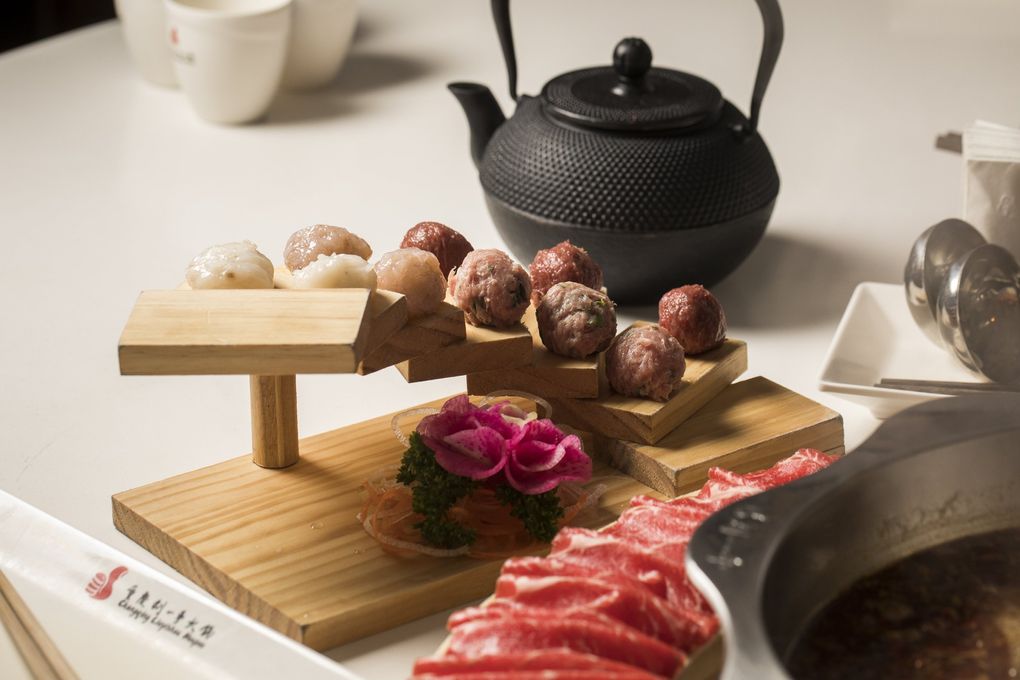 The selected handmade balls platter at Liuyishou Hotpot in Bellevue comes with shrimp, cuttlefish, pork and beef. (Bettina Hansen / The Seattle Times)