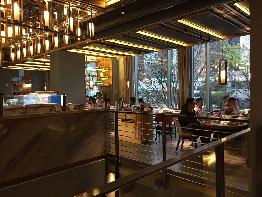 The international chain The Dolar Shop, with 52 locations including in Paris and Dubai, rolled out a chic, two-story bar restaurant at The Bravern in Bellevue, its first in Washington state. (Bethany Jean Clement / The Seattle Times)