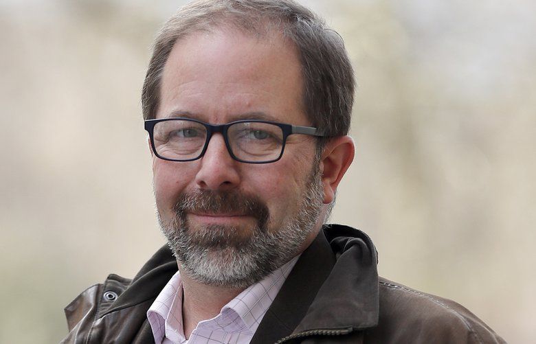 Keir Giles, a Russia specialist with Britainâ€™s Chatham House think tank, poses for a photo in central London on Thursday, Feb. 28, 2019. Giles was one of three people targeted by an undercover agent calling himself Lucas Lambert. An Associated Press investigation has found that the operation appears to have been directed at critics of the Russian antivirus firm Kaspersky Lab. (AP Photo/Frank Augstein) FAS501 FAS501