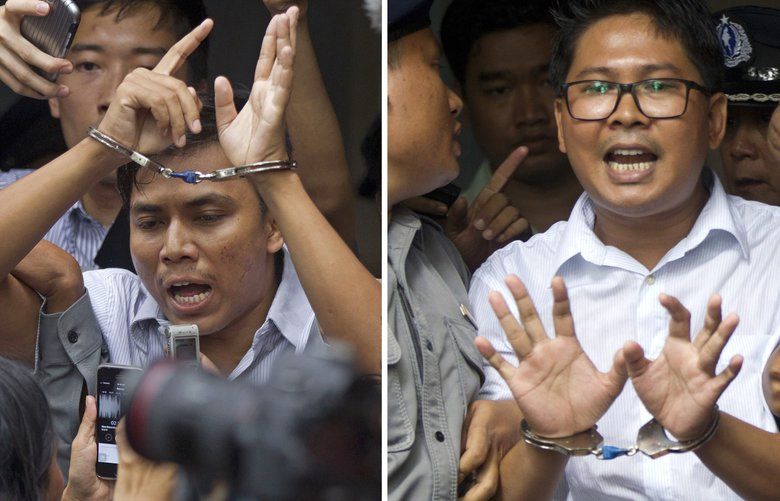 FILE – In this Sept. 3, 2018, combination file photo, Reuters journalists Kyaw Soe Oo, left, and Wa Lone, are handcuffed as they are escorted by police out of a court in Yangon, Myanmar. Myanmar’s Supreme Court on Tuesday, April 23, 2019, rejected the final appeal of the two Reuters journalists and upheld seven-year prison sentences for their reporting on the military’s brutal crackdown on Rohingya Muslims. They earlier this month shared with their colleagues the Pulitzer Prize for international reporting, one of journalism’s highest honors. (AP Photo/Thein Zaw, File) TKTT106 TKTT106