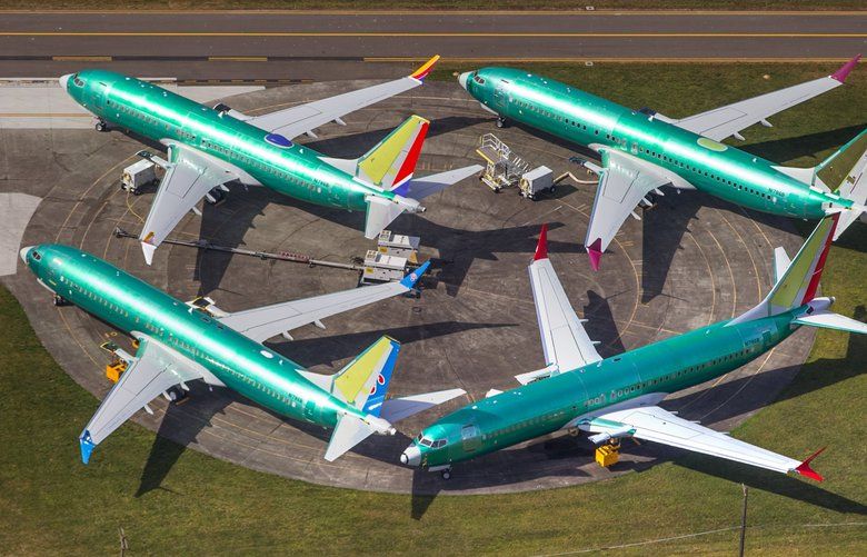 Boeing 737’s, many of which are MAX 8 and 9’s in various stages of completion, are parked up and down the sides of the Renton Municipal Airport runway on March 15, 2019. 209629