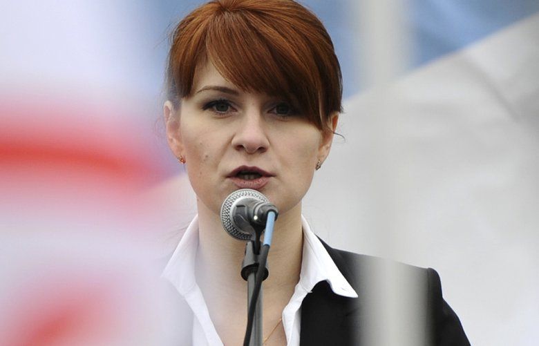 FILE – In this photo taken April 21, 2013, Maria Butina, leader of a pro-gun organization in Russia, speaks to a crowd during a rally in support of legalizing the possession of handguns in Moscow, Russia. (AP Photo/File) WX939 WX939