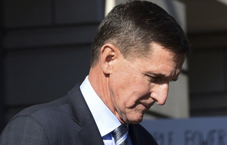 FILE – In this Dec. 1, 2017, file photo, former Trump national security adviser Michael Flynn leaves federal court in Washington. (AP Photo/Susan Walsh, File) WX904 WX904