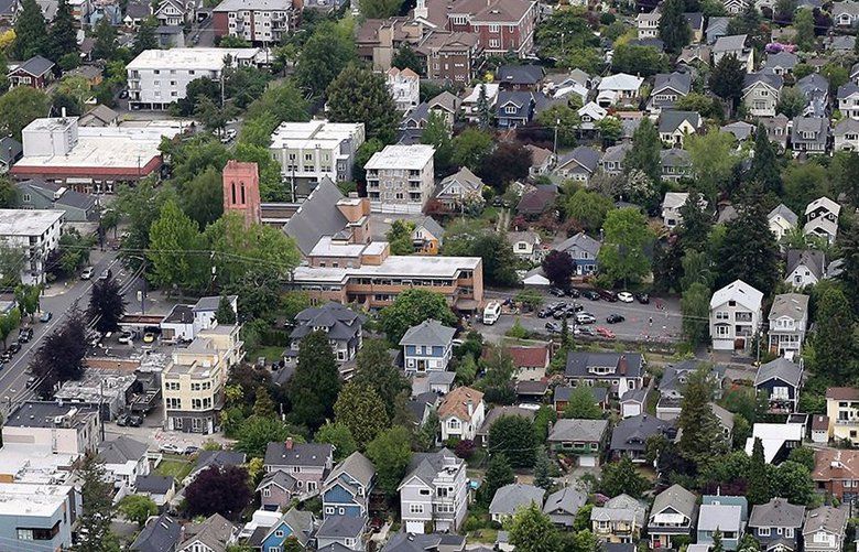Traffic and Real Estate aerial.
Taken May 17, 2018, this is an aerial of of Greenwood, with Greenwood Ave North slicing from lower left to upper right. 206324 206324