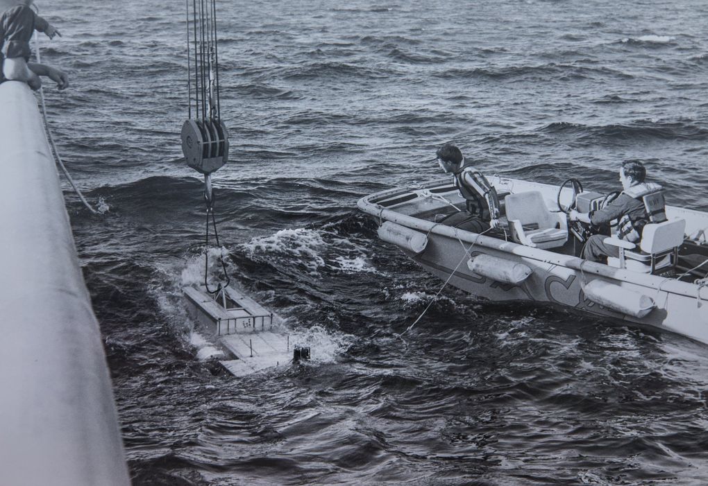 In this photo from 1985, a “tow fish” device, holding the ballast and electronics for detecting the shipwreck, is lowered into the Atlantic off of South Carolina in search of the SS Central America.