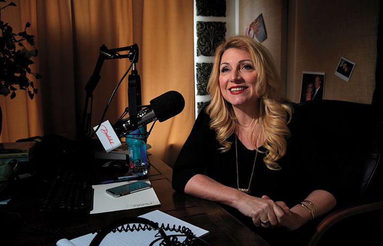 Radio star Delilah sits in her West Seattle studio after recording segments for her radio show Wednesday, March 27, 2019.