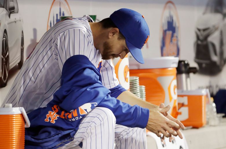 Mets' deGrom strikes out nine in a row, 14 total