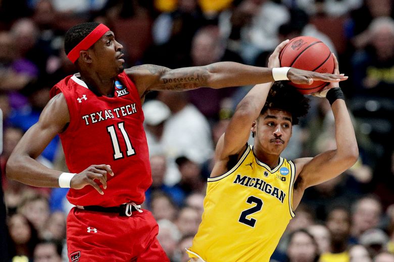 Michigan says Jordan Poole staying in draft