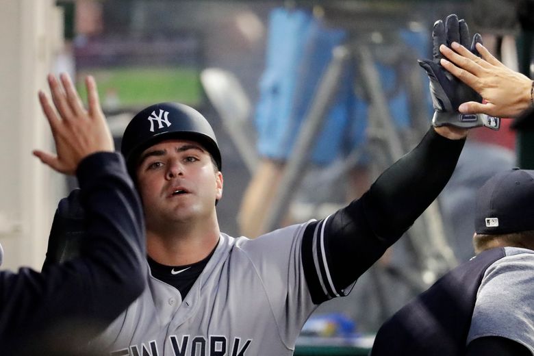 New York Yankees' Luke Voit celebrates after hitting a 2-run