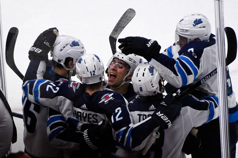 Trouba scores twice as Jets down Wings 